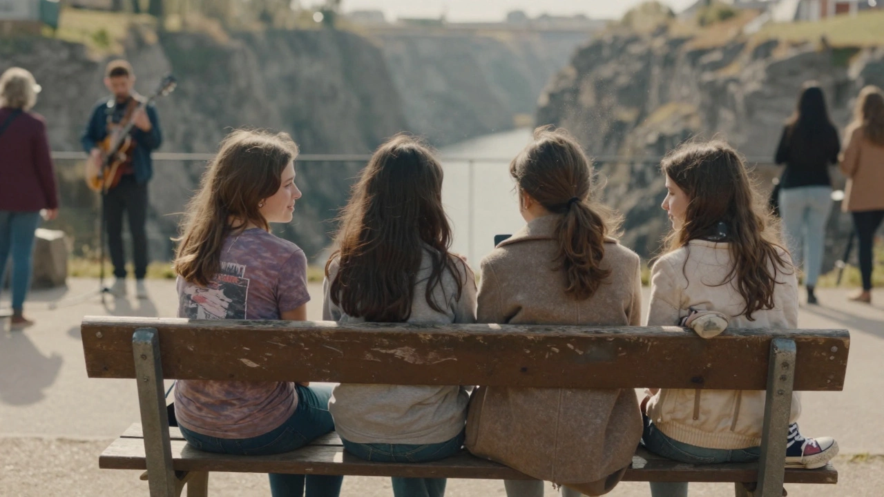 Girls sit quietly on a mossy bench by the river, no phones, shared glance, one in a vintage coat, sunlight catching dust in the air.